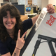 Journalist posing with a shell e-scooter